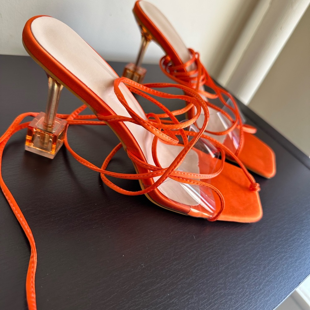 Brand new orange square tie up heels never worn great condition.